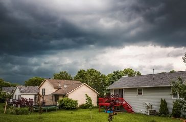 houses with storm cloud