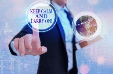 Writing note showing Keep Calm And Carry On. Business photo showcasing slogan calling for persistence face of challenge Elements of this image furnished by NASA.