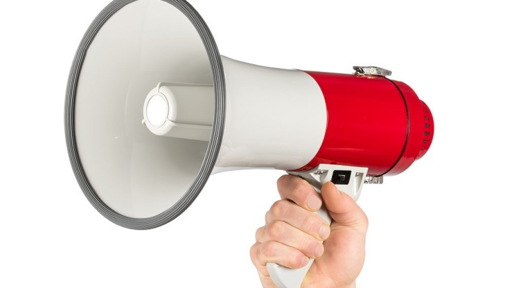 hand with red gray megaphone bullhorn isolated on white background