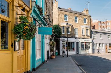 Picturesque street with small business and stores at Notting Hill in London, UK