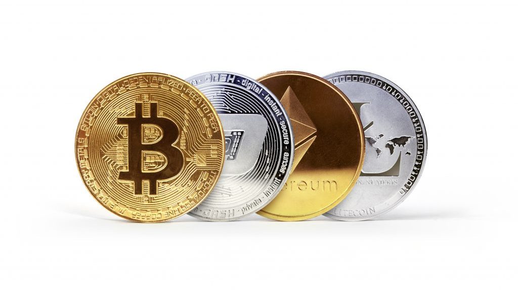 Bitcoin, Dash, Ethereum and Lite coins. Set of popular cryptocurrencies. Isolated on white background.