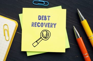 Business concept meaning DEBT RECOVERY with phrase on the piece of paper.