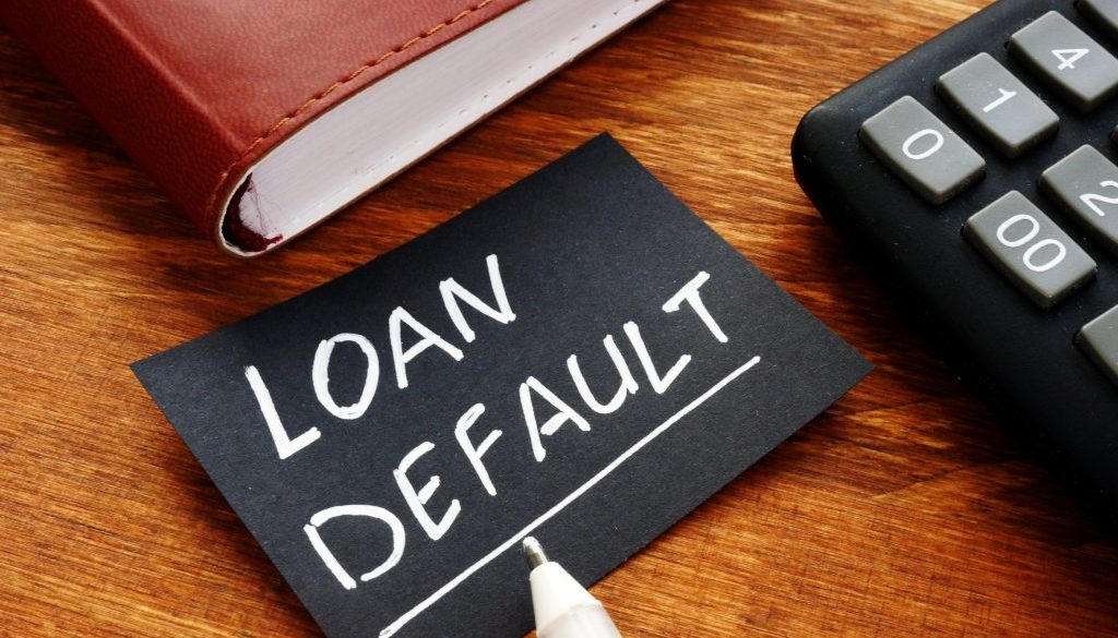 Business photo shows printed text Loan default
