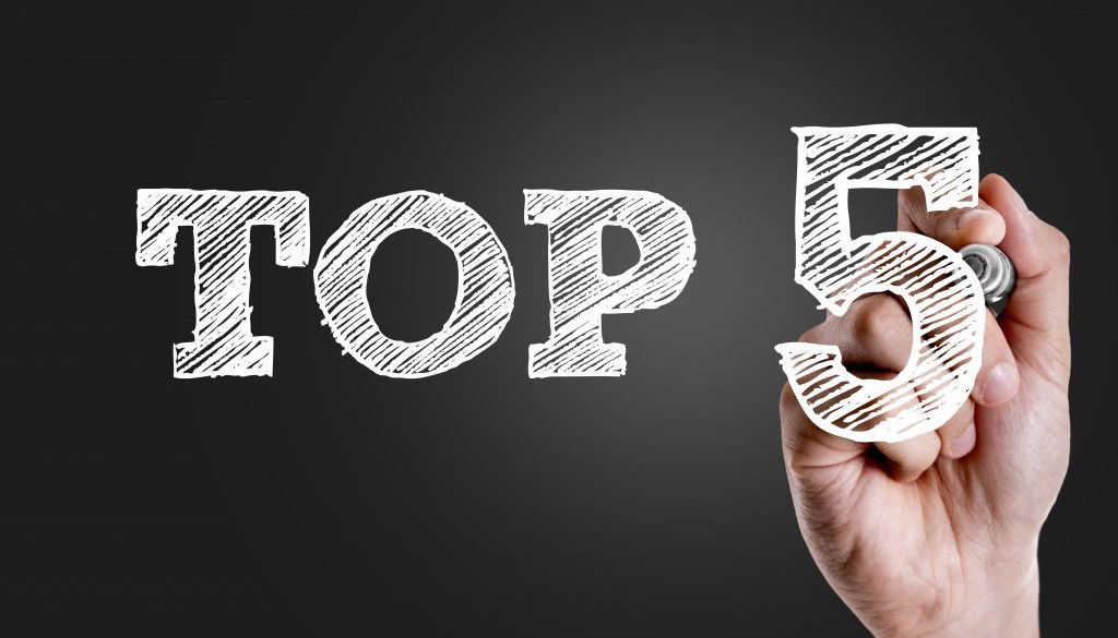 Hand writing the text: Top 5