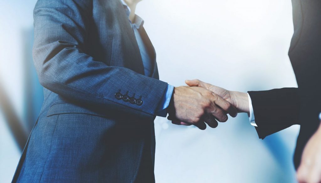 businessmen handshake - business meeting and partnership concept