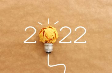 2022 background with light bulb made from paper